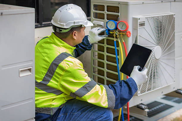 Professional Hvac Maintenance technician working in Raynham, MA